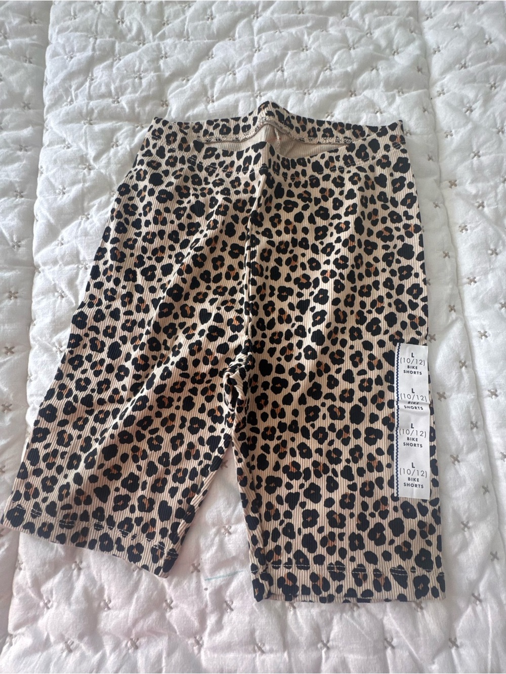 Cat & Jack Leopard Print Bike Shorts in Tan and Black
